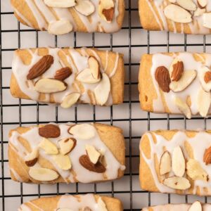 Almond bars on a wire rack.