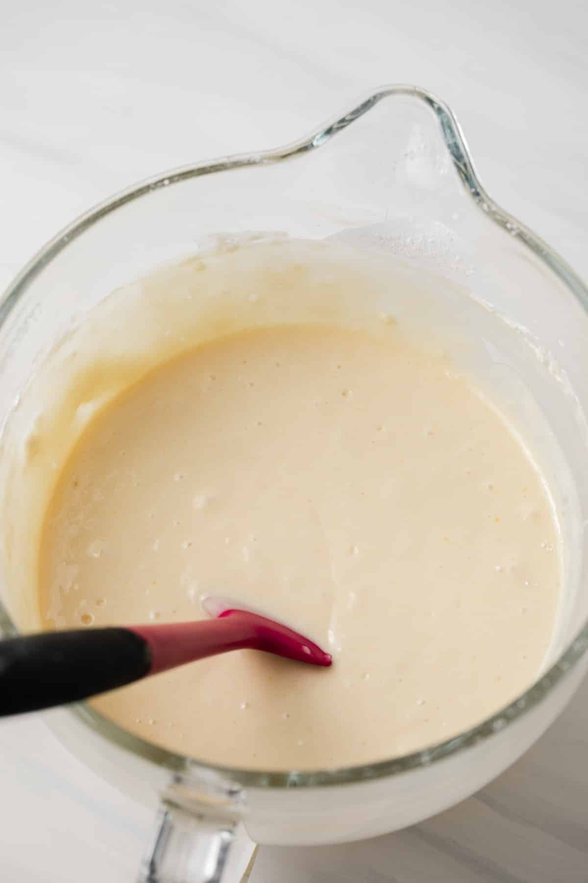 Cupcake batter in glass bowl.