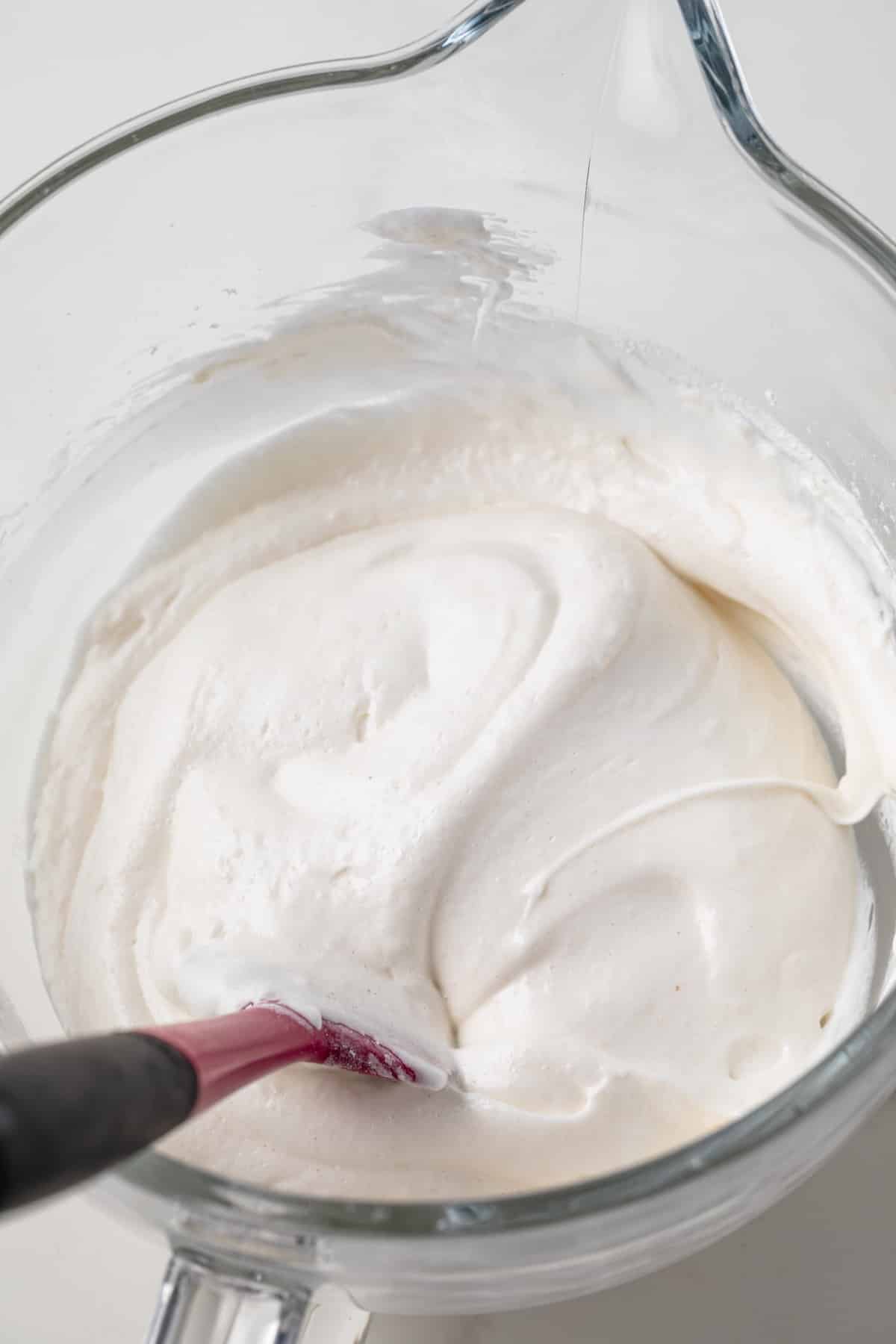Cupcake batter in a glass bowl.