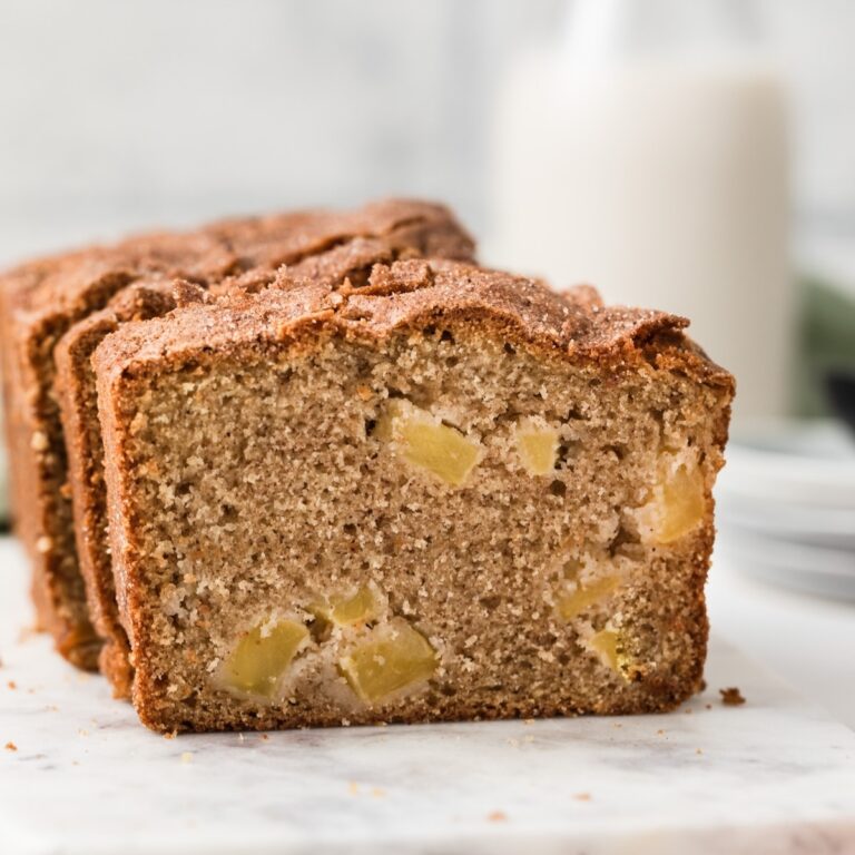 front view of open face apple bread on marble slab