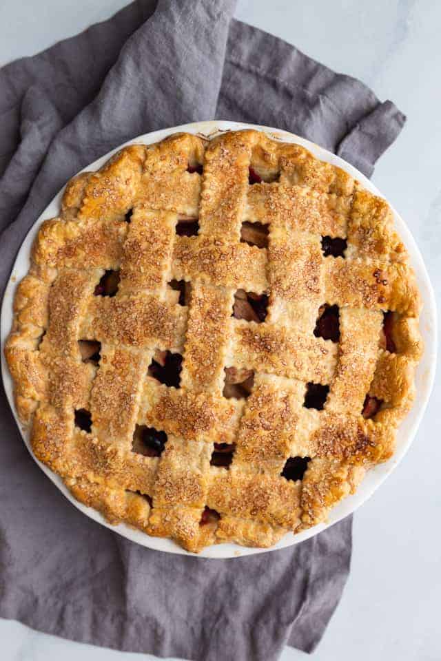 overhead view of a baked apple cranberry pie