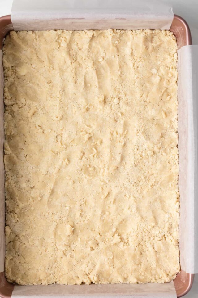 Shortbread crust pressed into a 13x9 pan