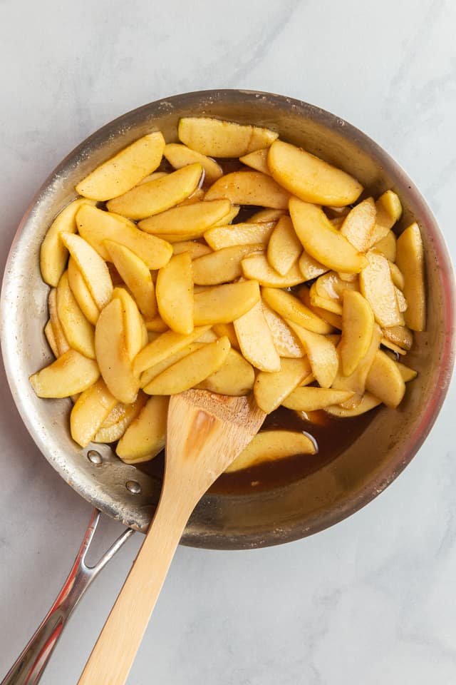 overhead view of sliced apples in a pot