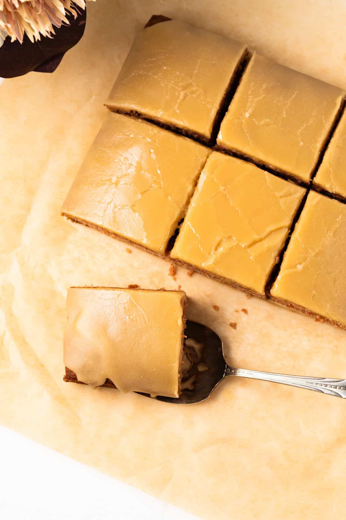 Slice of applesauce cake being pulled away.