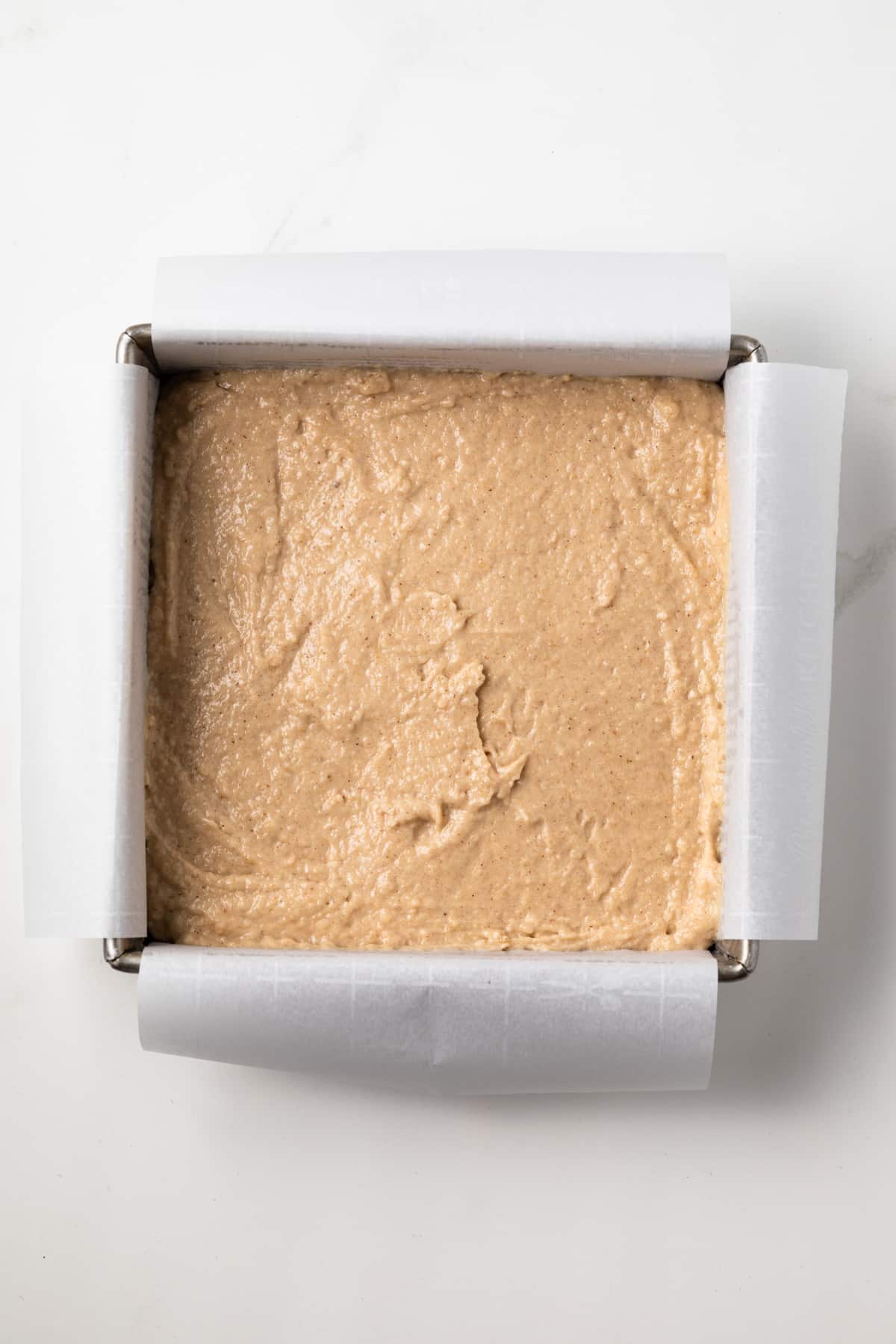 Unbaked cake in a pan.