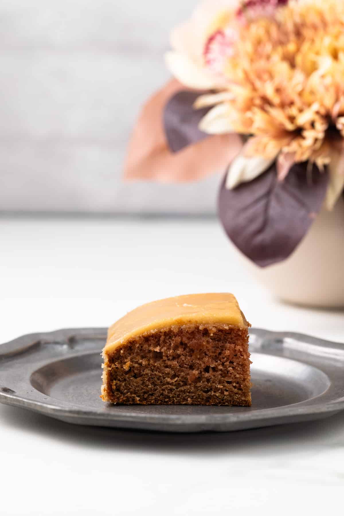 Side view of applesauce cake slice.
