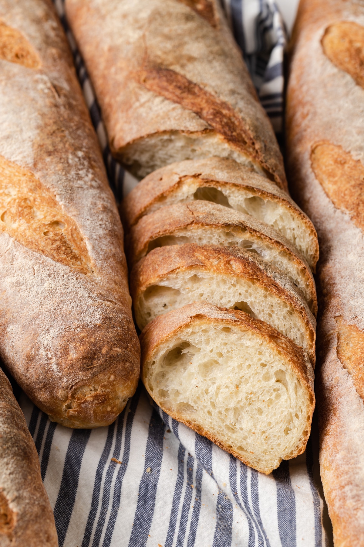 baguettes with one sliced into ½ inch slices