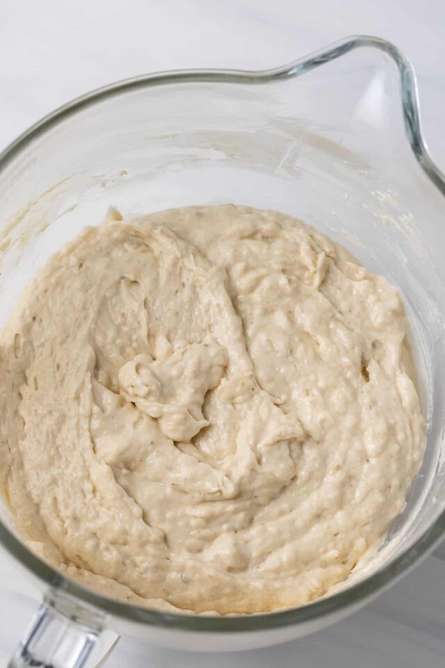 Banana cake batter in a mixing bow