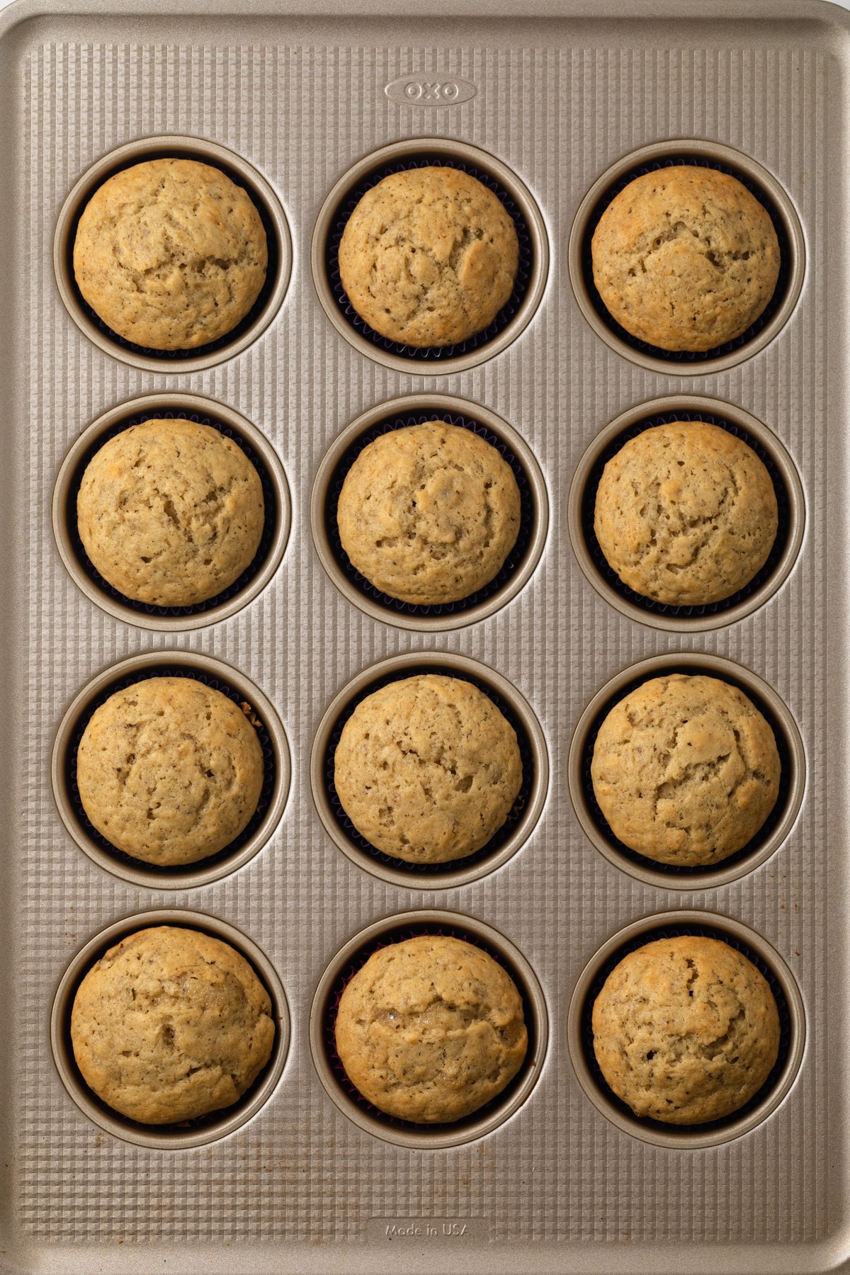 Banana muffins in muffin tin.