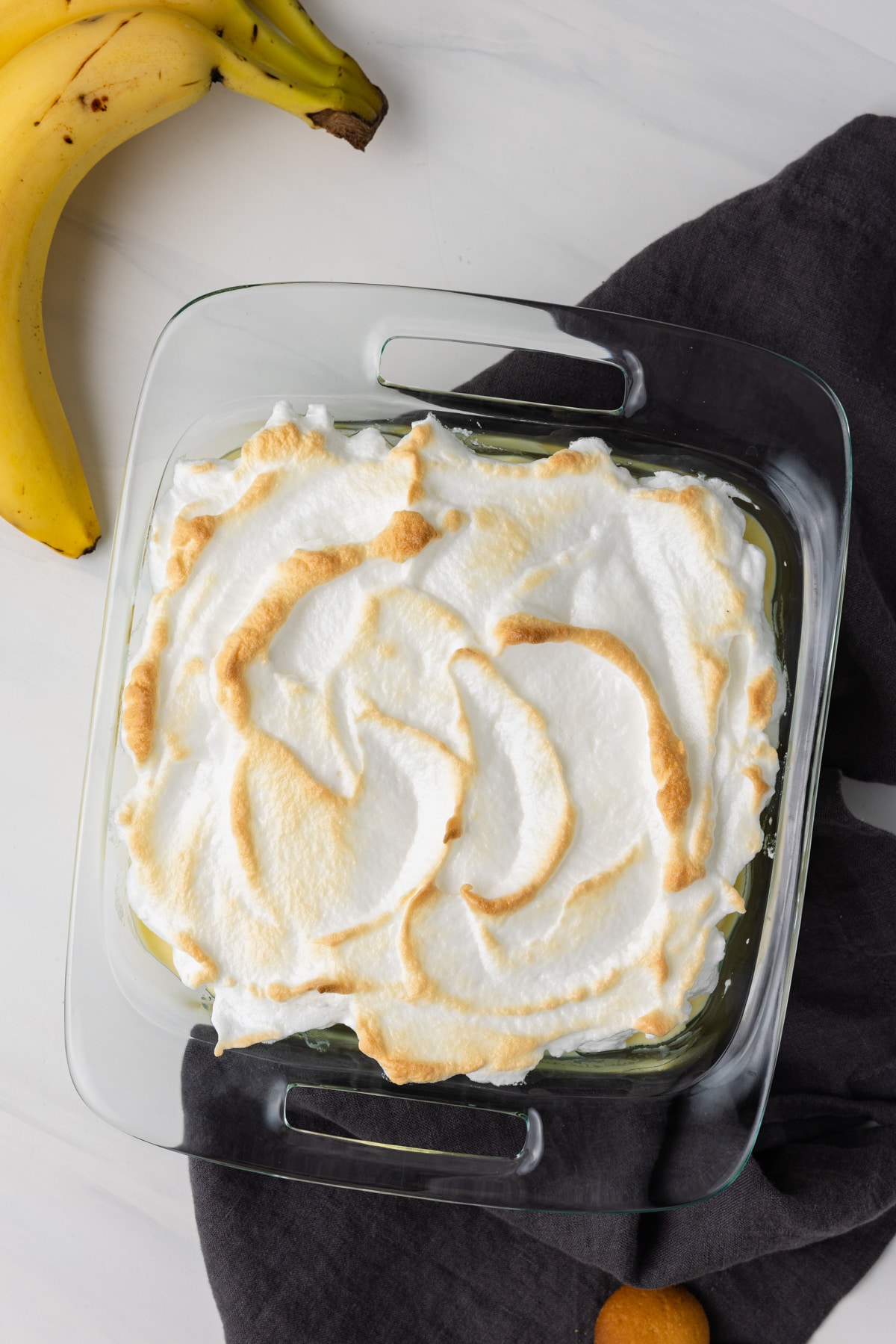 Overhead of banana pudding in a glass dish.