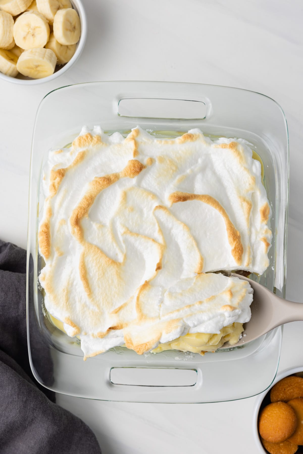Overhead of banana pudding with spoon.