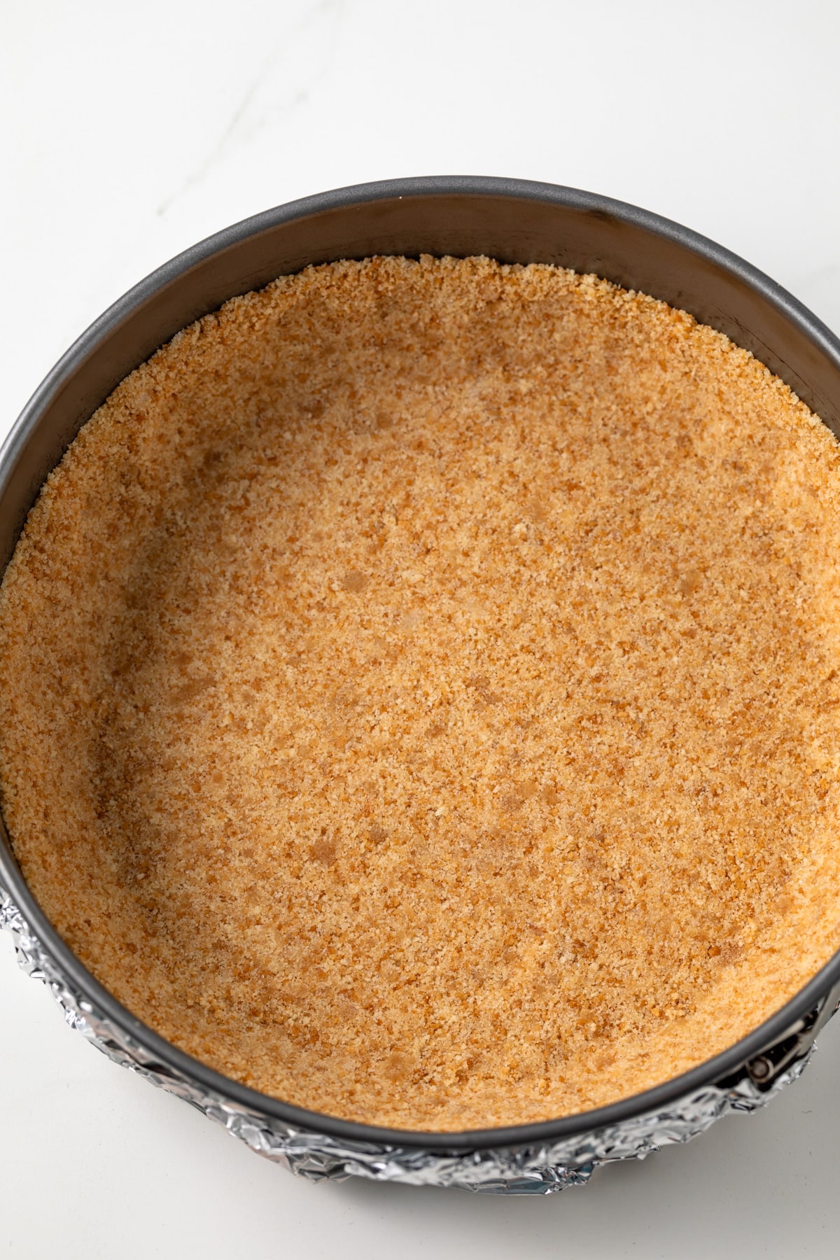 Nilla wafer cookie crust in springform pan.