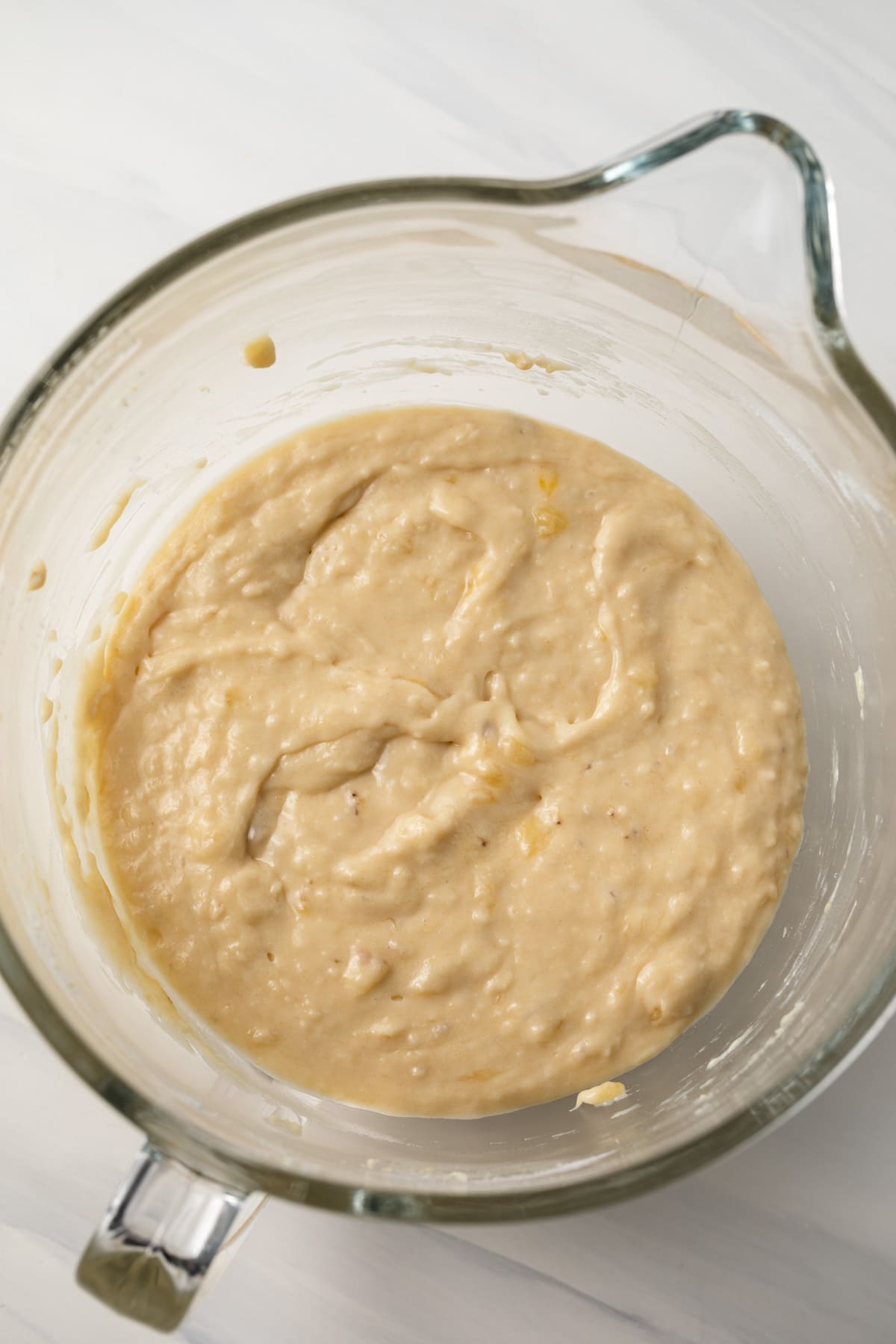 Batter for banana cupcakes in mixing bowl.