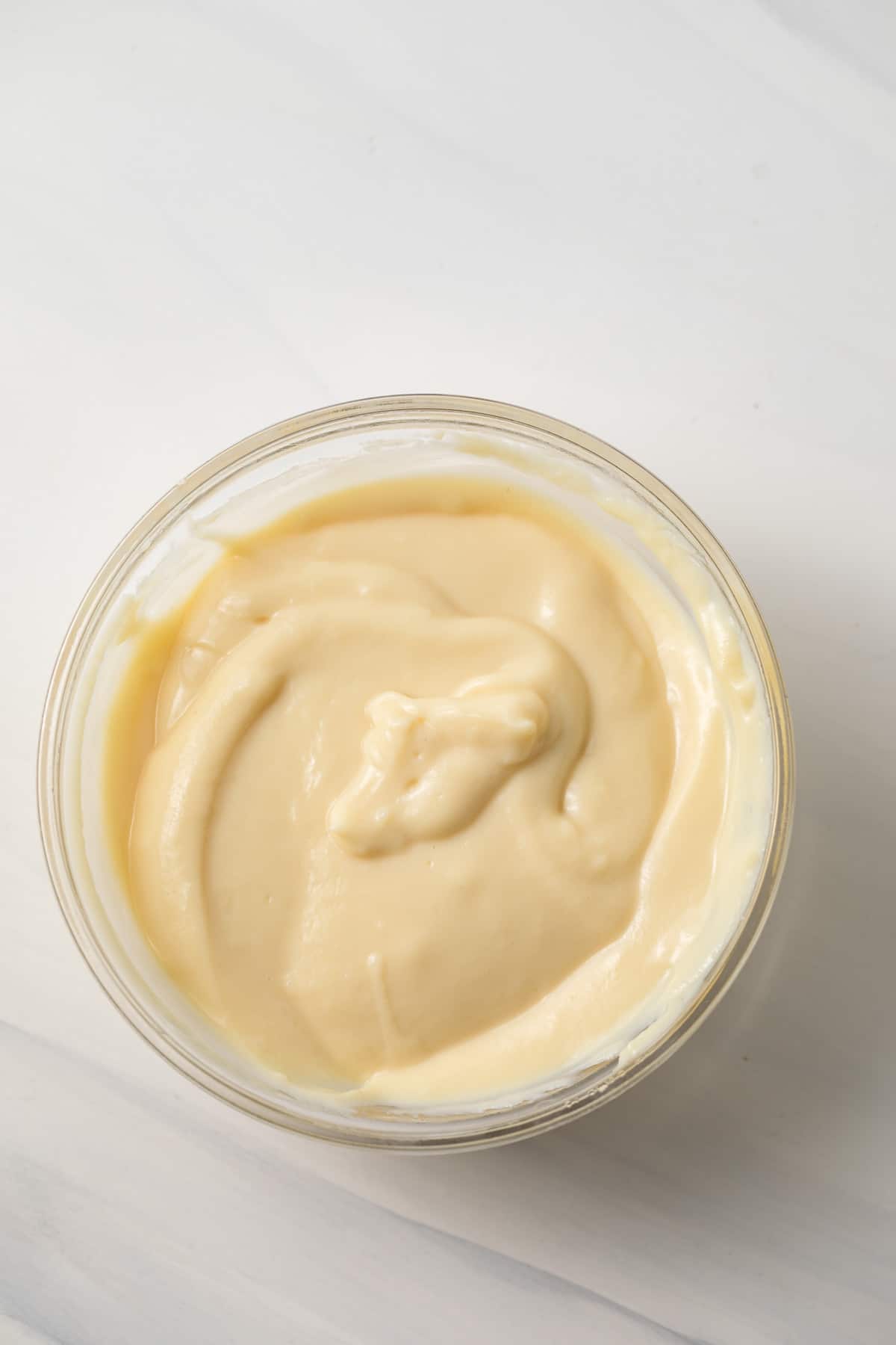 Vanilla pudding in glass bowl.