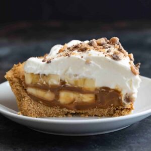 Slice of Banoffee Pie on a white plate