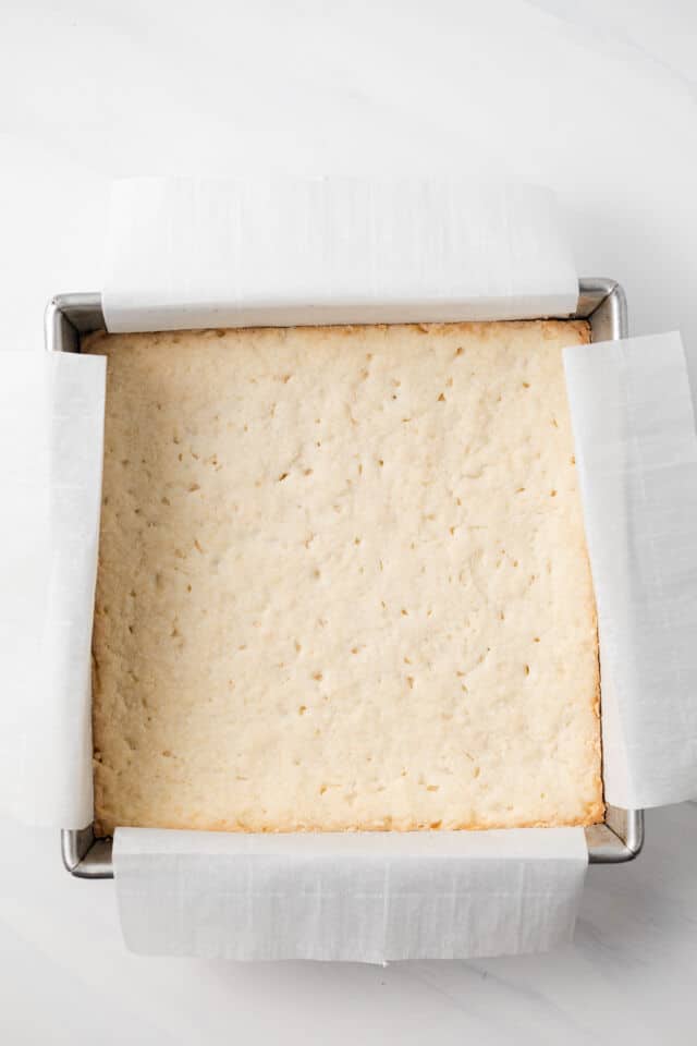Baked shortbread crust in baking pan.