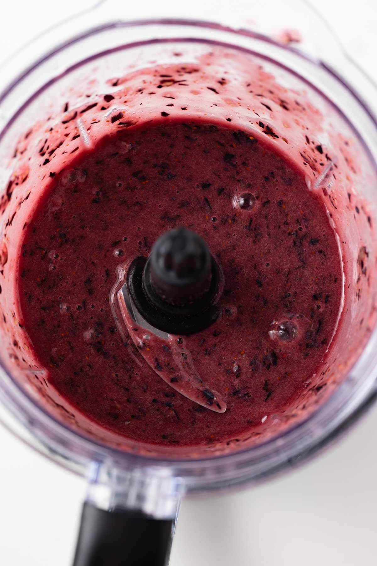 Pureed blueberries in blender.