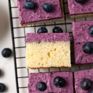 Blueberry mousse cake on wire rack.