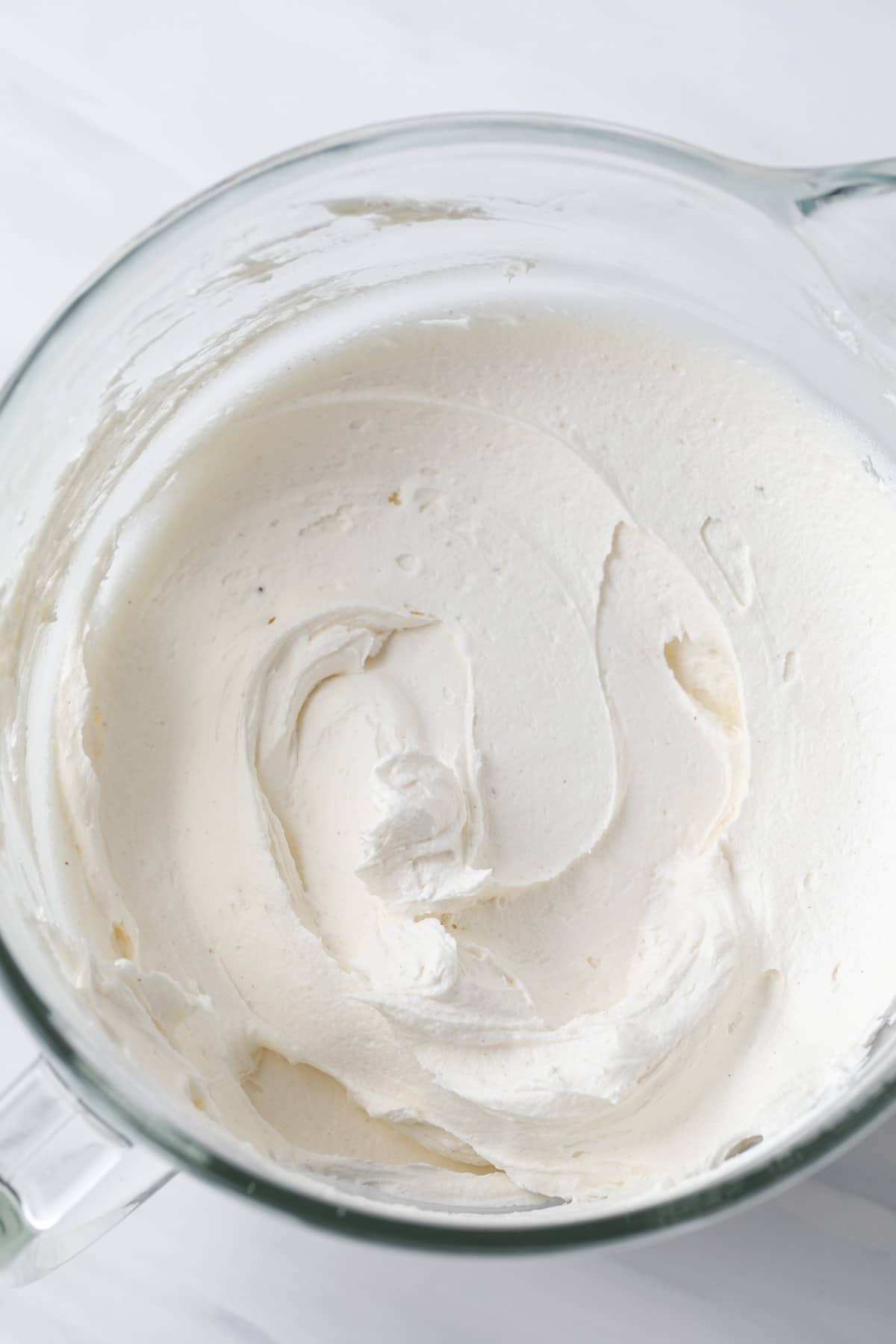 creamy brown butter frosting in glass bowl
