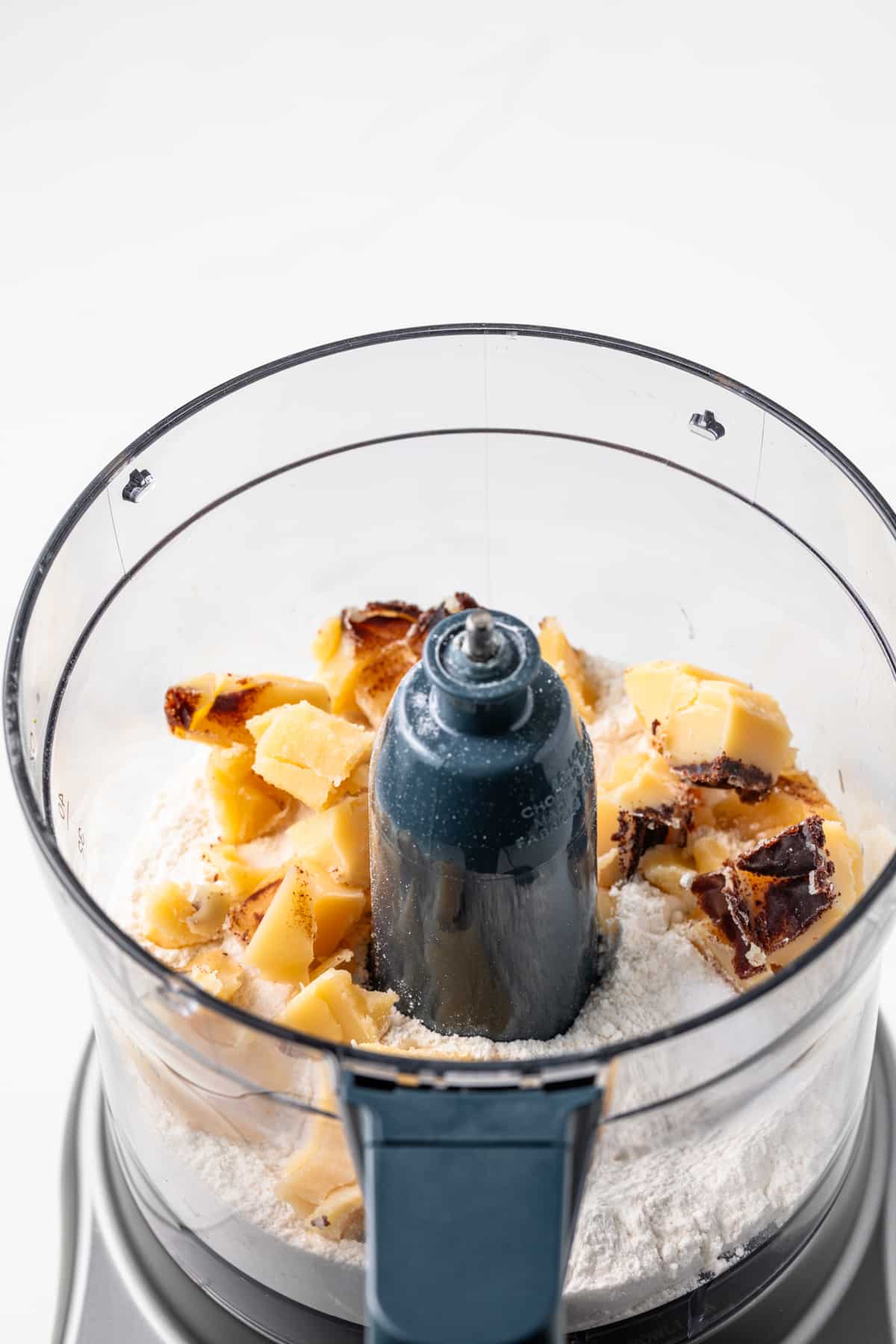 Flour and brown butter in food processor.