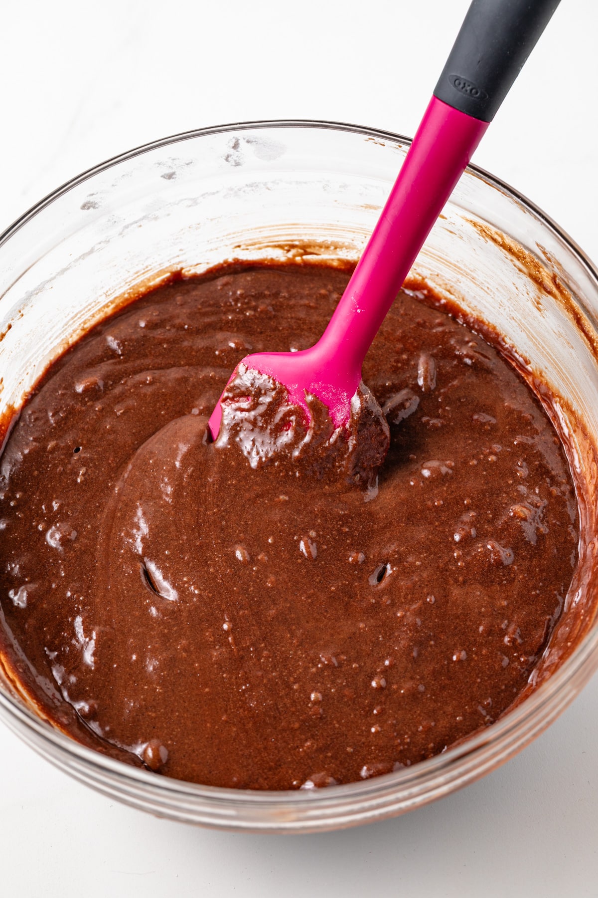 brownie batter in glass bowl.