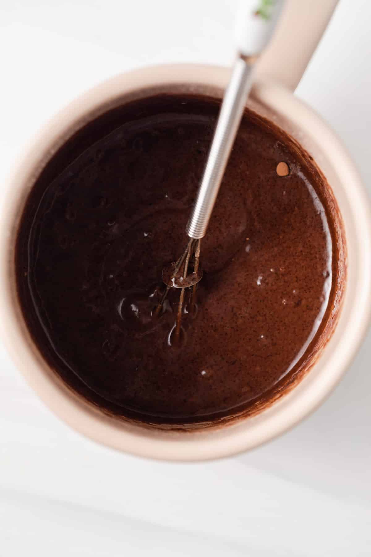 Brownie batter in a mug.
