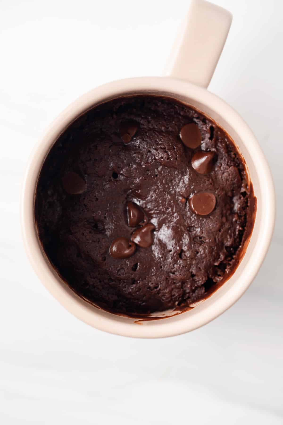 Overhead of brownie in a mug.