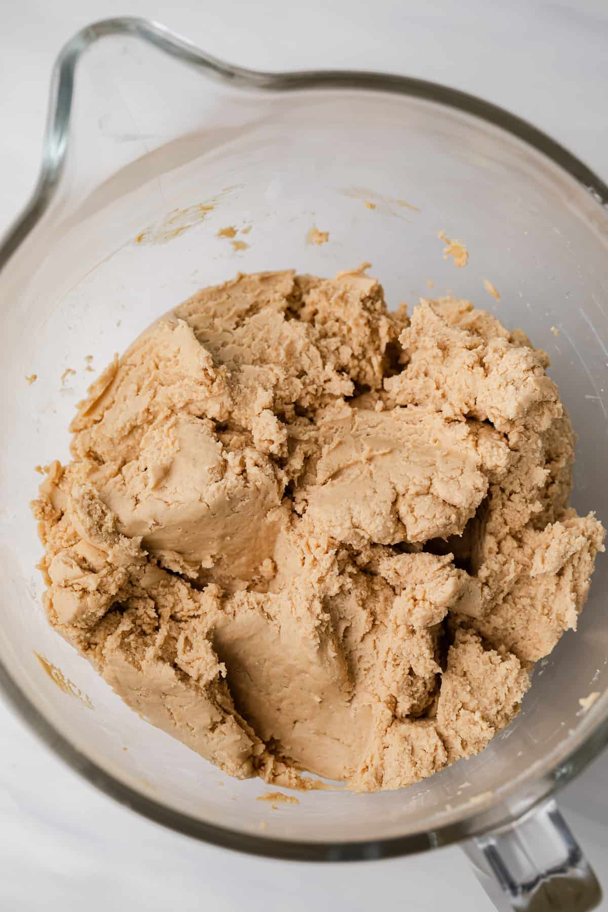 peanut butter candy filling in a glass mixing bowl