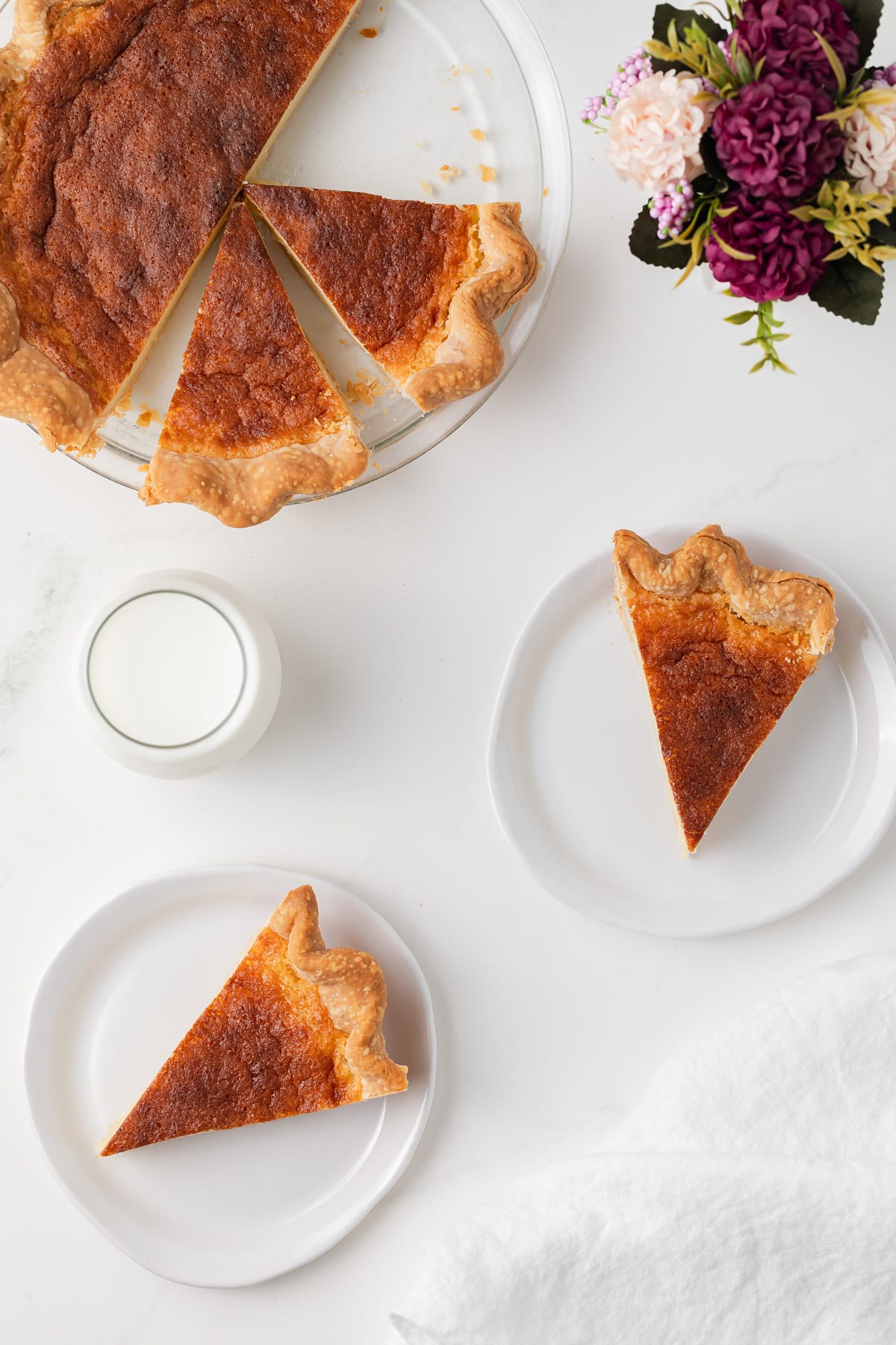 Slices taken out of buttermilk pie.