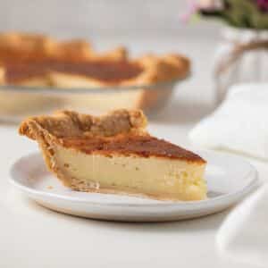 Side view of slice of buttermilk pie.