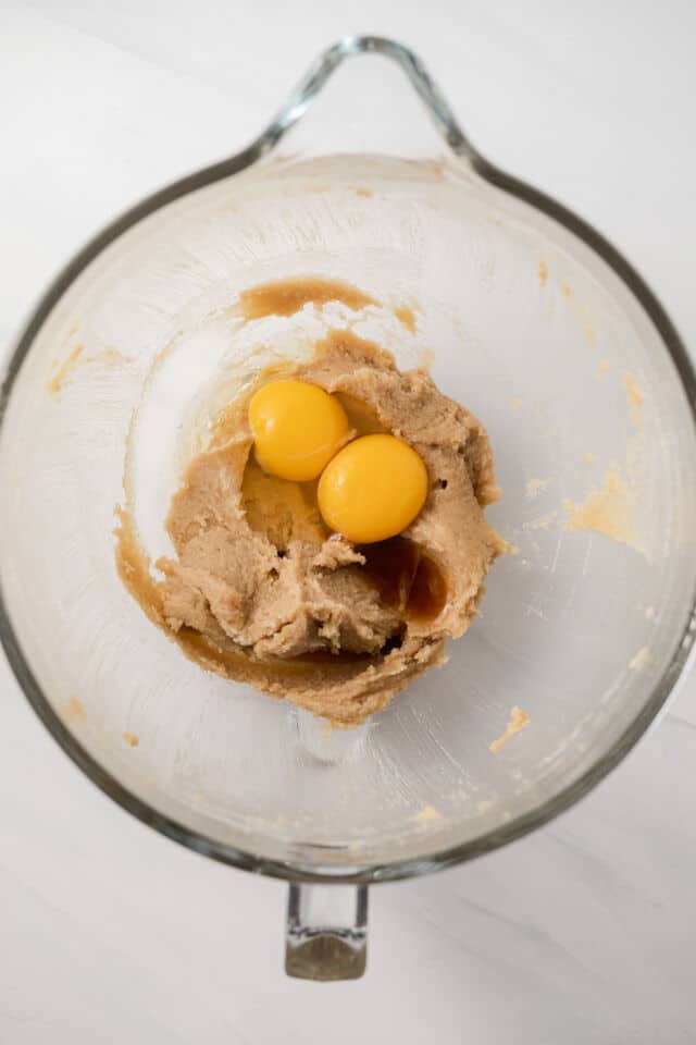 Wet ingredients in combined in a glass bowl.