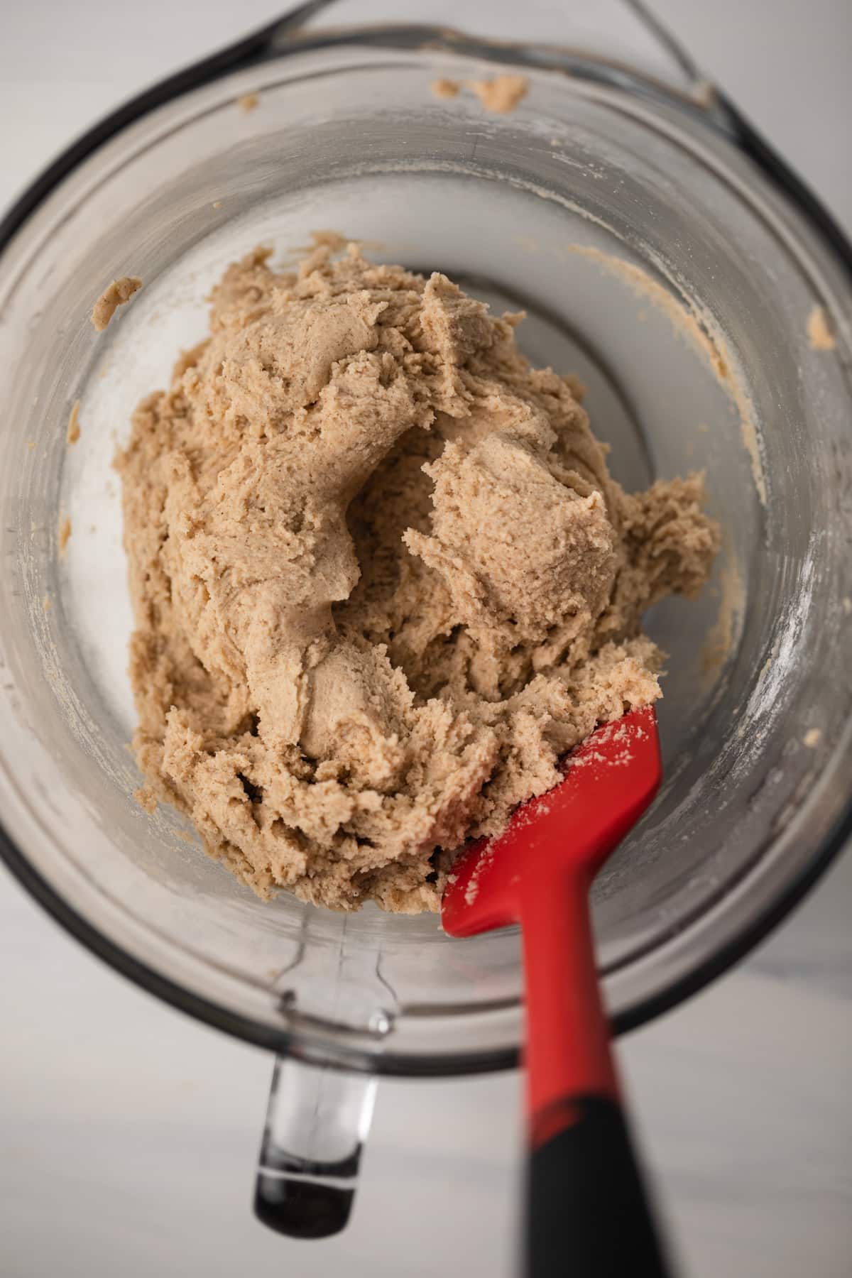 Cookie dough in glass bowl.
