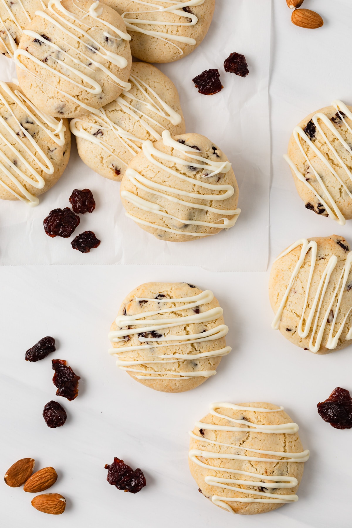cherry almond cookies scattered with dried cherries and almonds