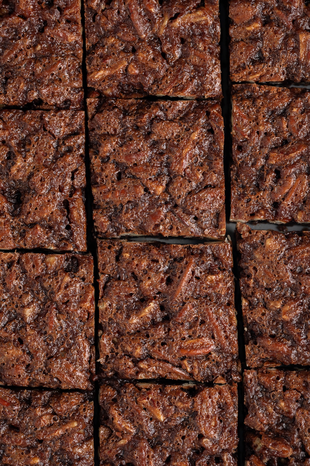 Overhead of chocolate bourbon pecan bars,