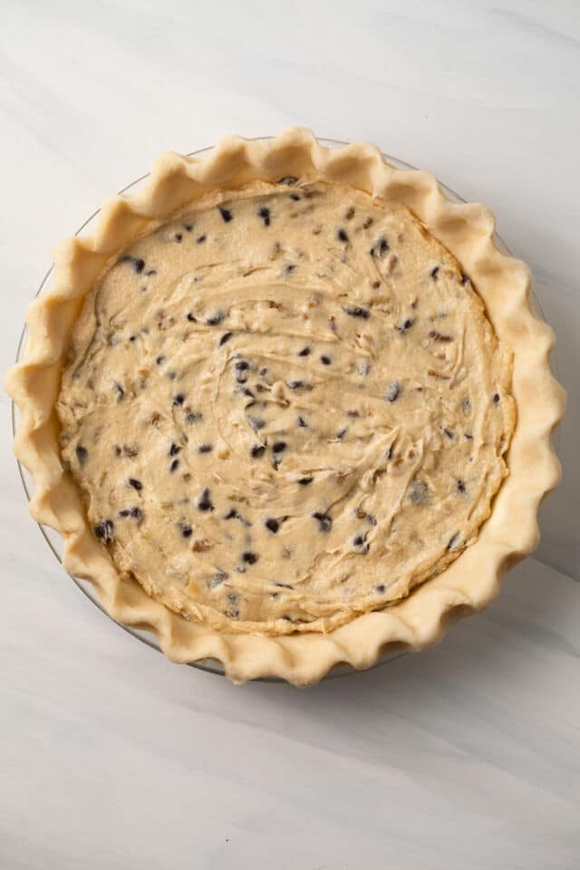 Unbaked chocolate chip pie.