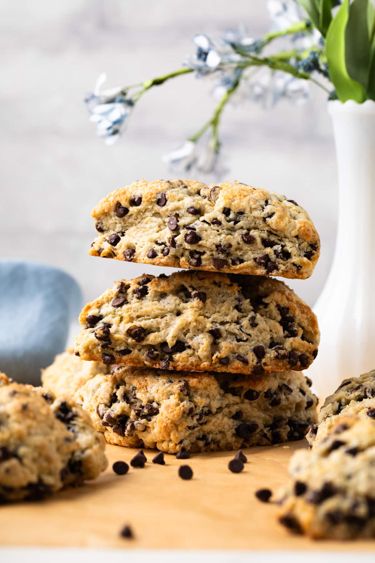 Chocolate chip scones stacked 3 high.