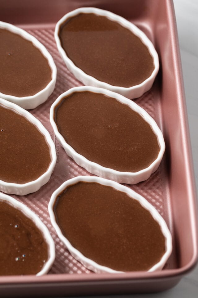 Chocolate custard in ramekins.