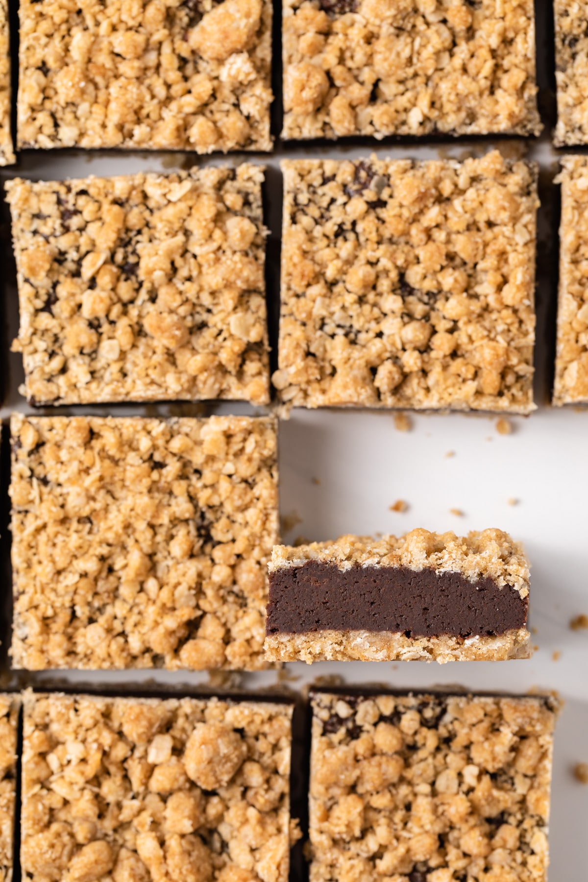 overhead of chocolate oatmeal bars with one turned on its side so the inside is visible