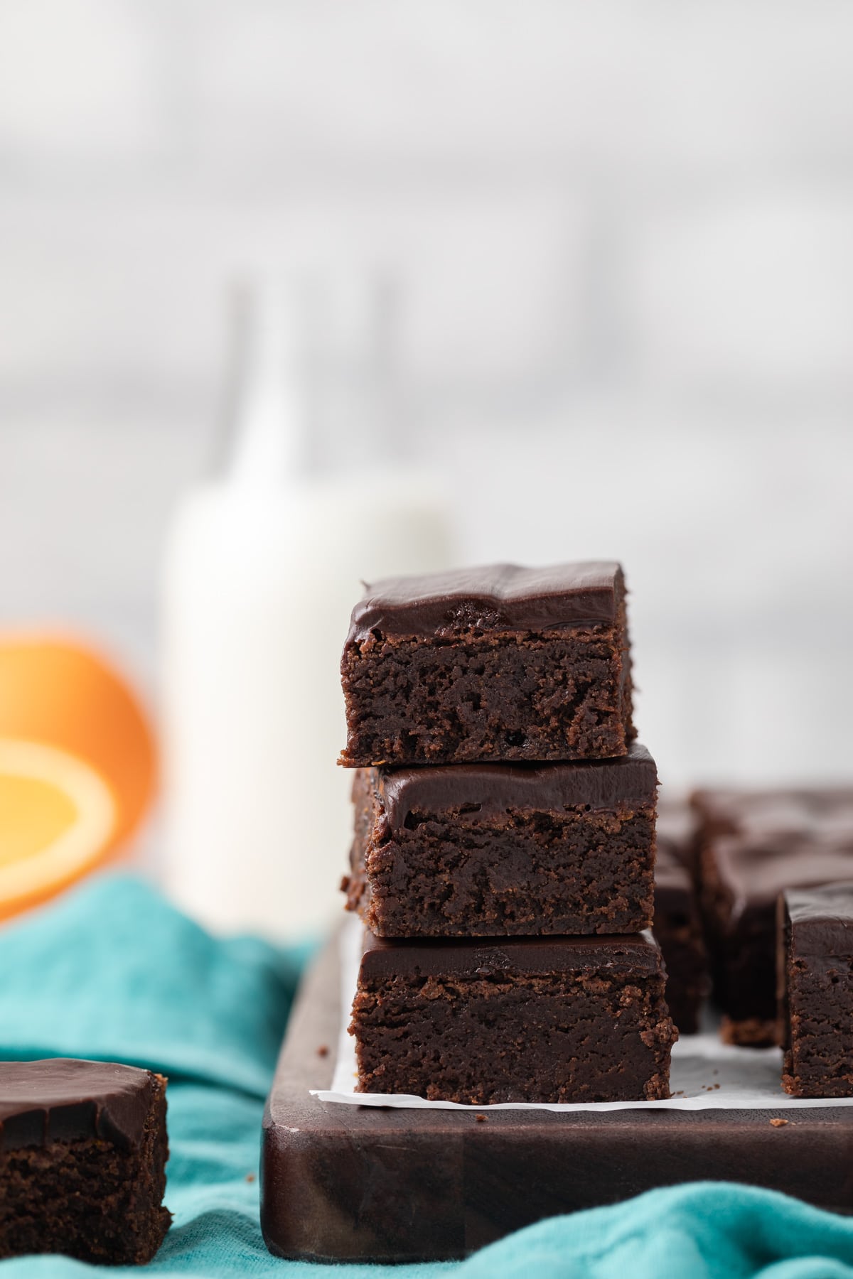 three chocolate orange brownies stacked