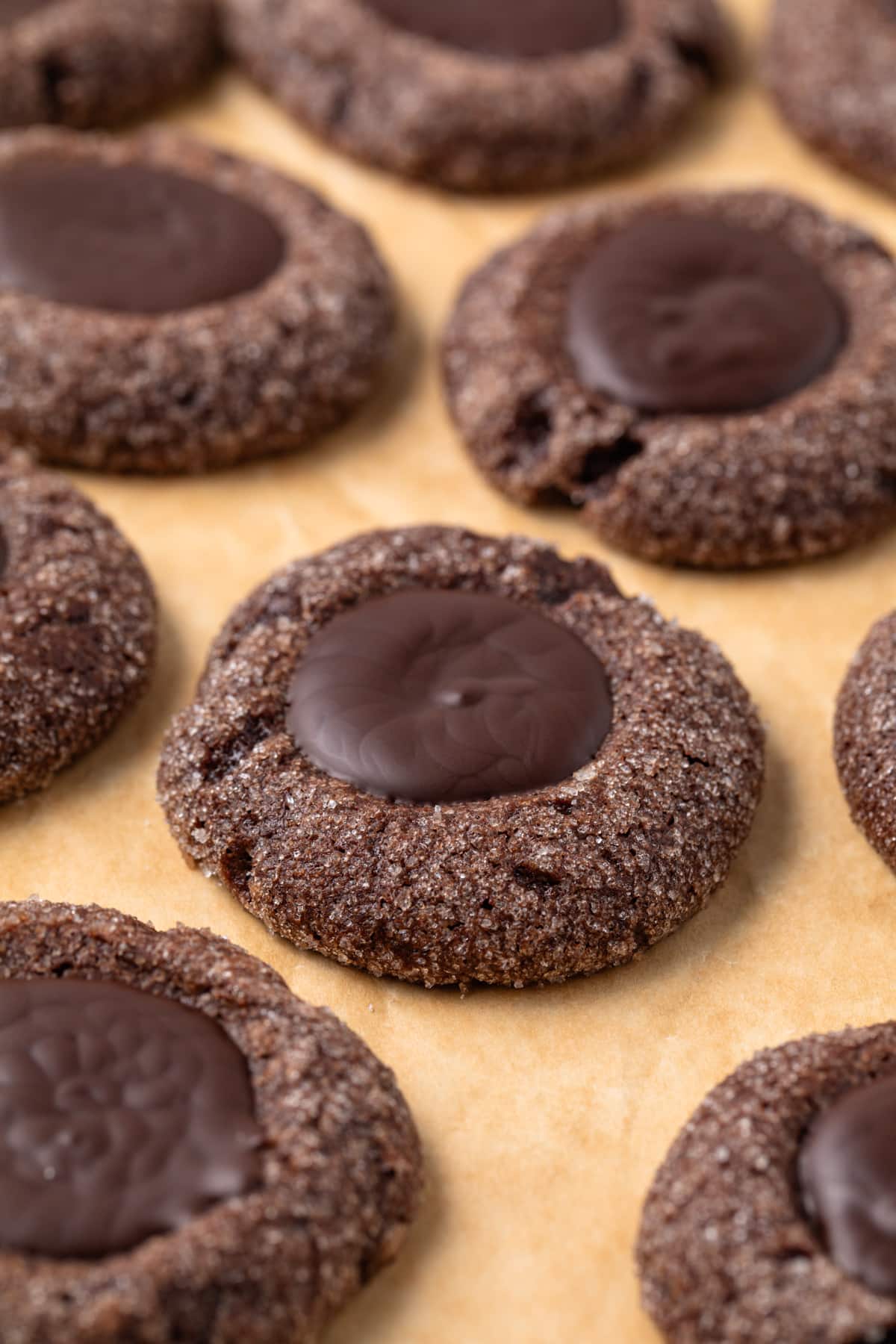 Side view of chocolate thumbprint cookies.