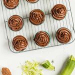 Overhead view of Chocolate Zucchini Cupcakes on a wire cooling rack.