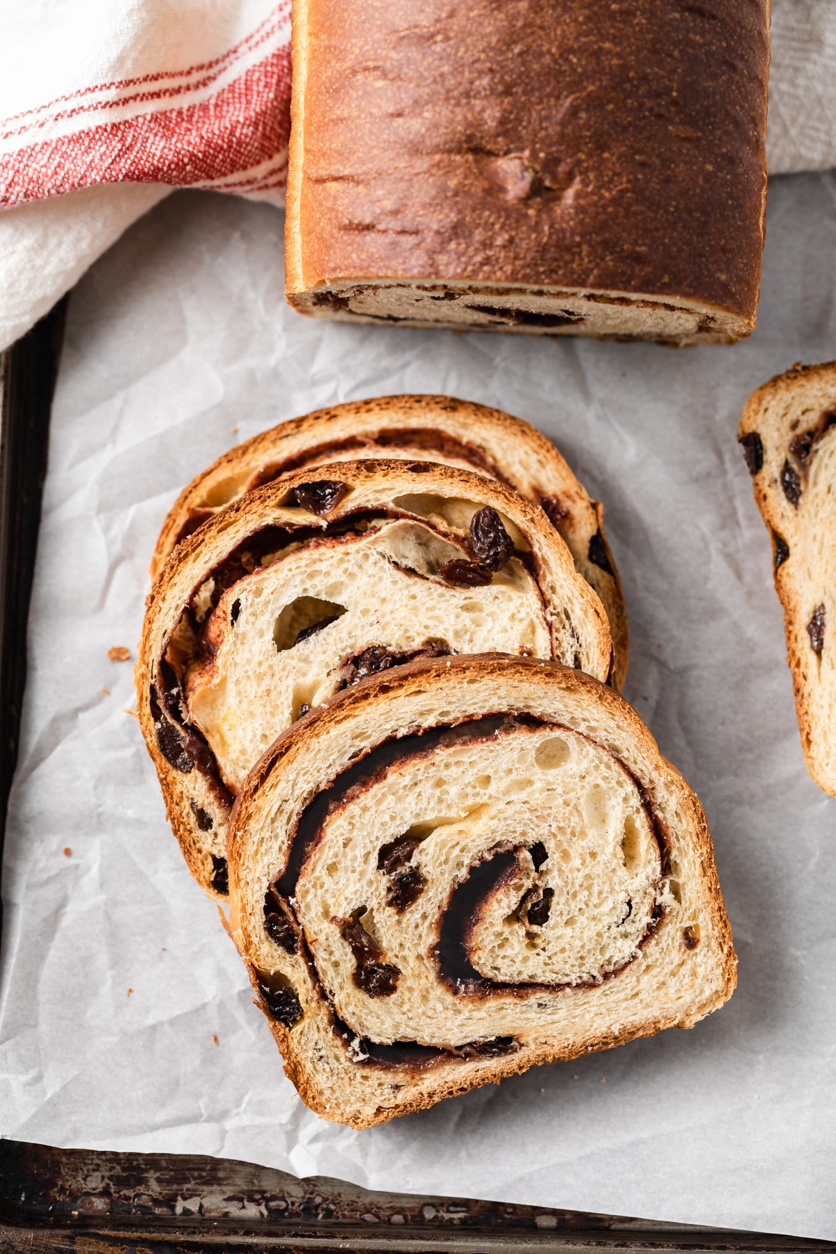 slices of cinnamon raisin bread laid so interior is visible