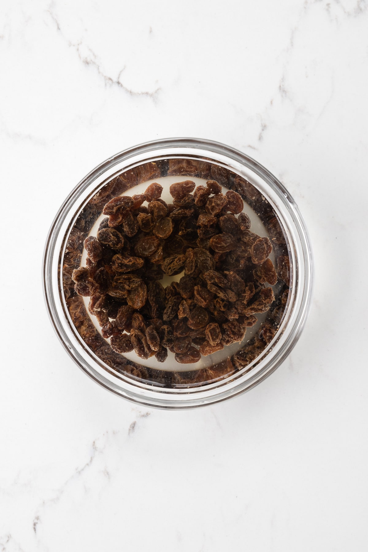 bowl of raisins soaking in water