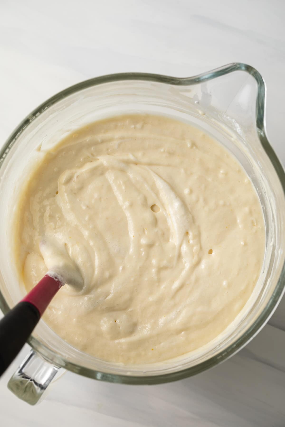 Coconut cake batter in a mixing bowl.
