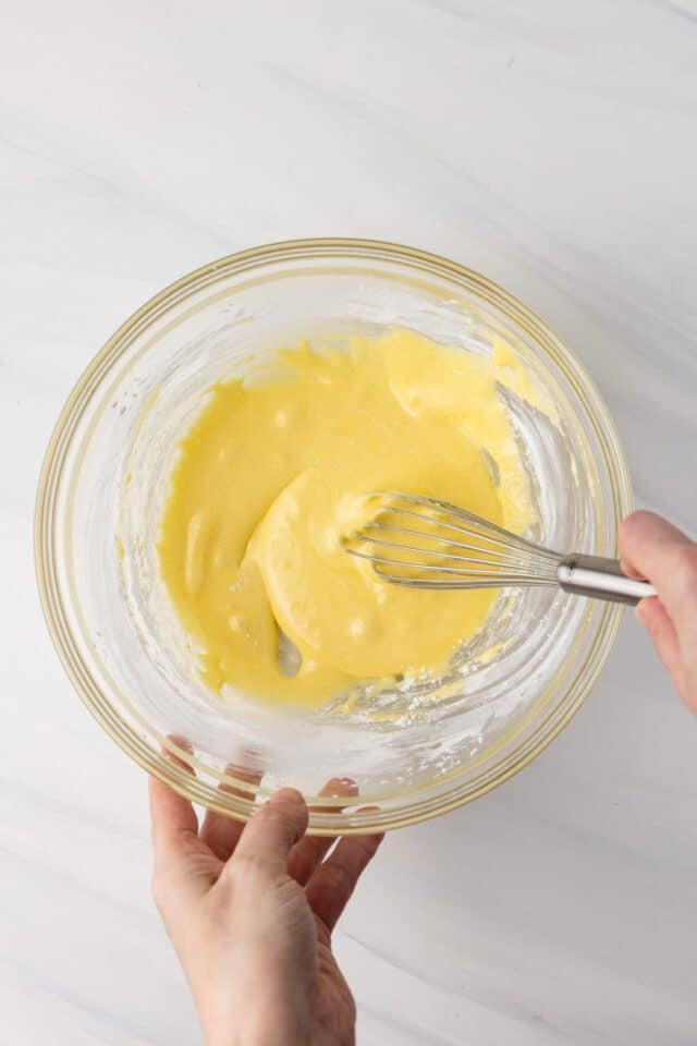 Mix egg yolk, sugar, and cornstarch.