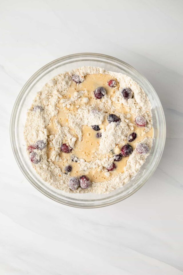 Cranberry orange scone dough in a mixing bowl