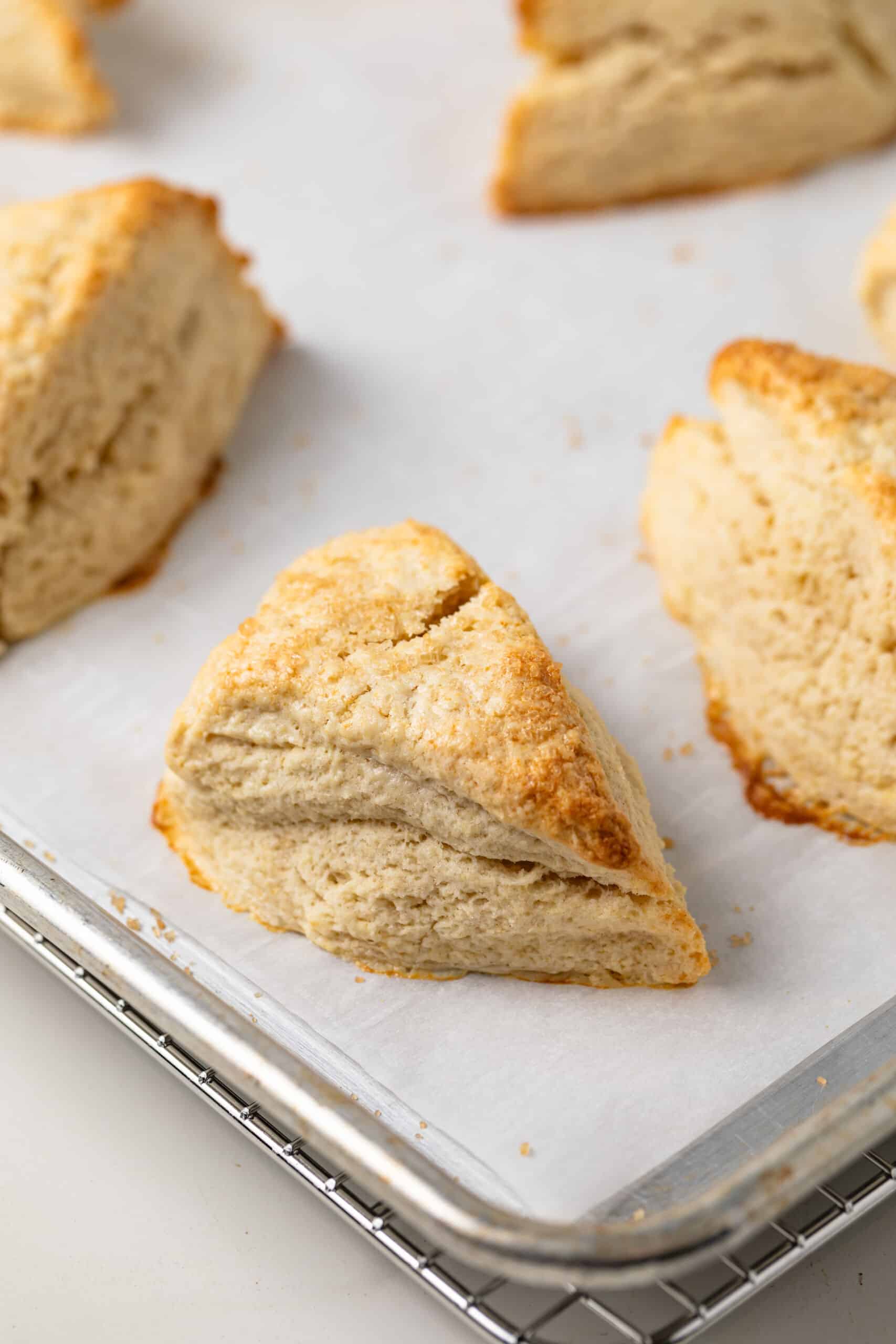 Baked scones on baking sheet.