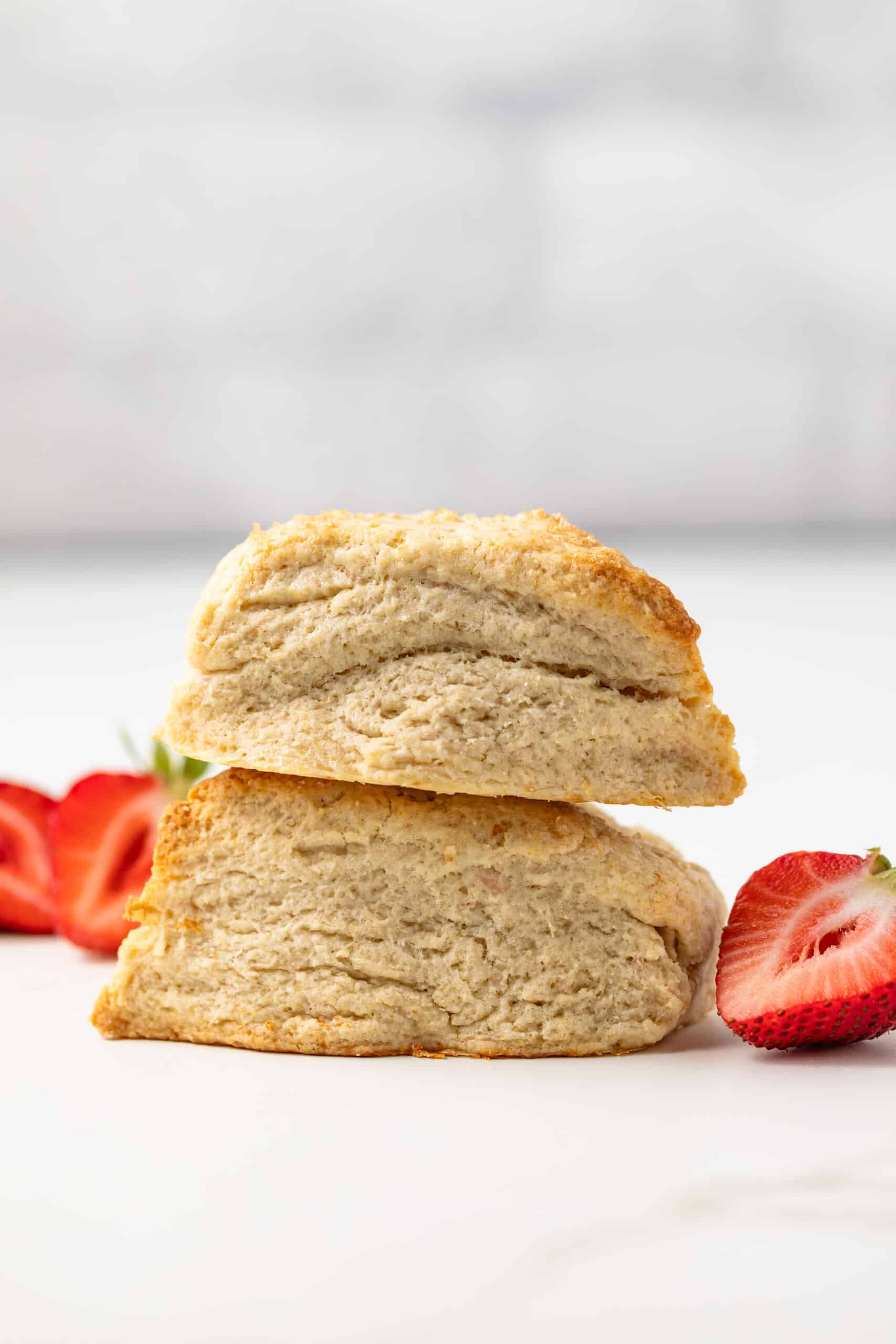 Two cream scones stacked.