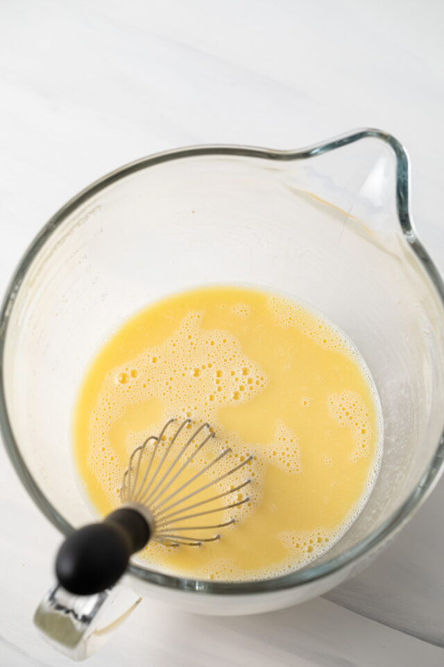 Eggs whisked in a measuring cup