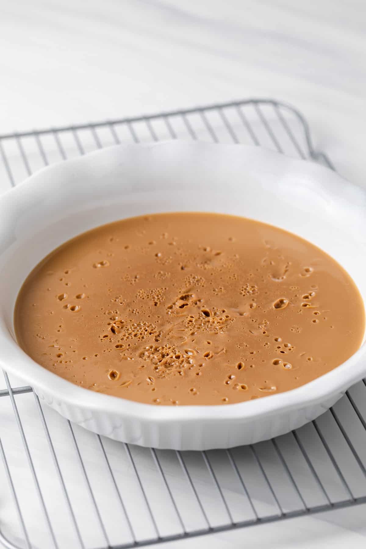 dulce de leche in white pie plate